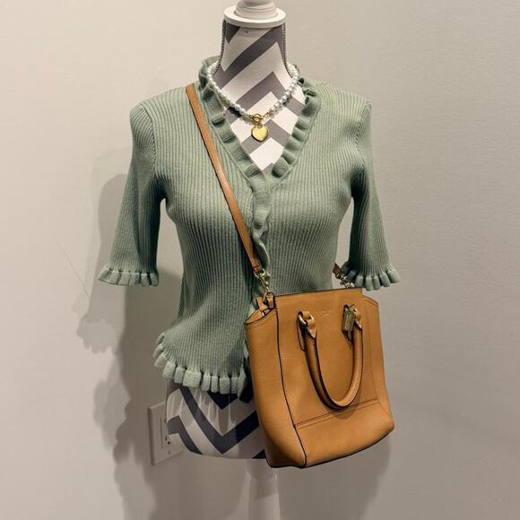 Green ribbed cardigan with ruffles and button closure - Picture 2 of 4